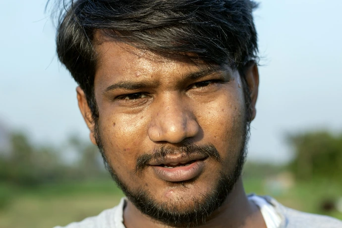 a close up of a man with a beard